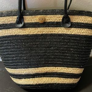 Gently used Black and Tan straw handbag
